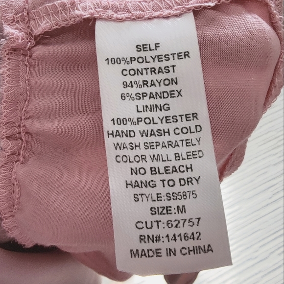 A sheer blousy one piece with texture - Picture 3 of 5